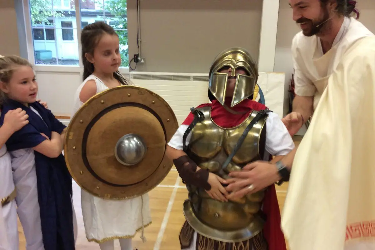 school children dressed as ancient greeks