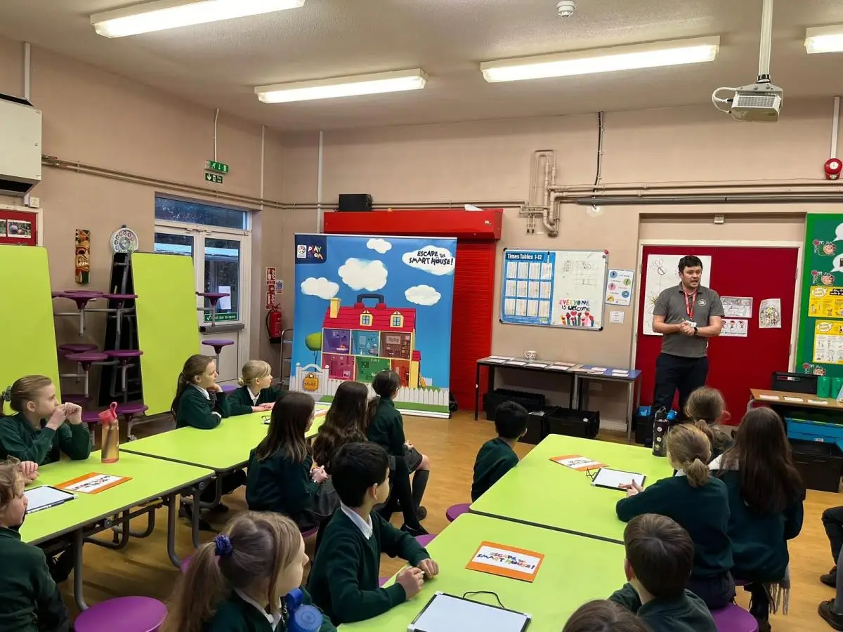 school children in a classroom learning about maths puzzles