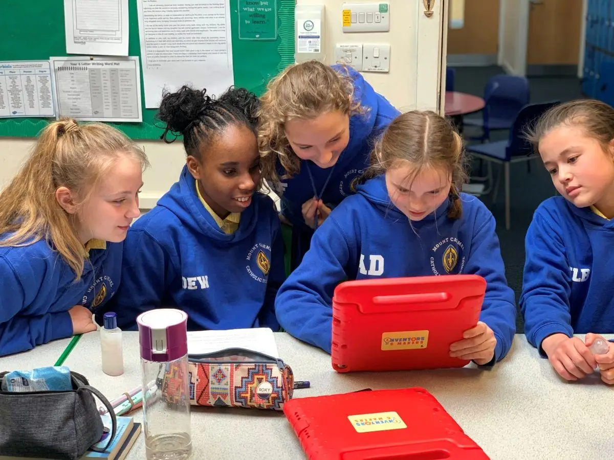 school group learning about computers