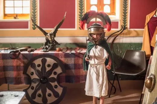 child dressed as a roman soldier