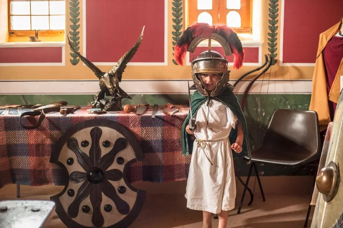child dressed as a roman soldier