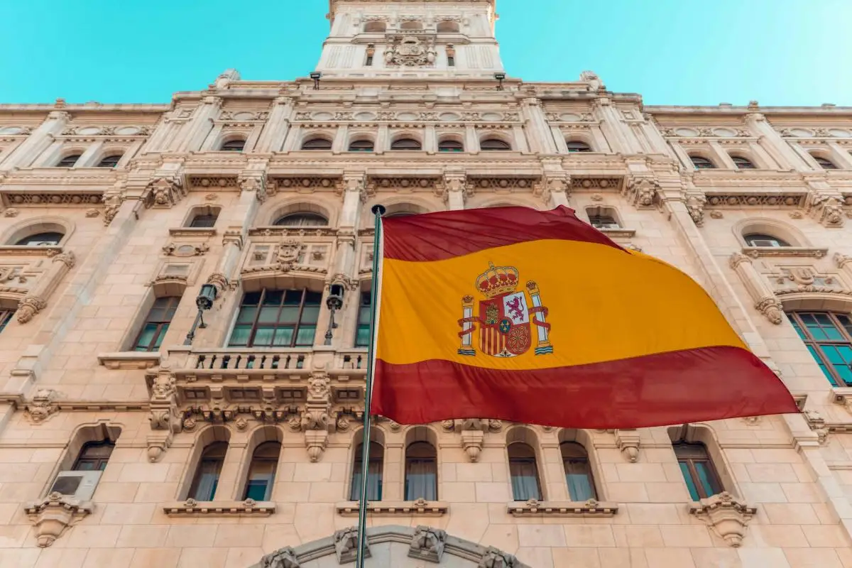 spanish flag and building