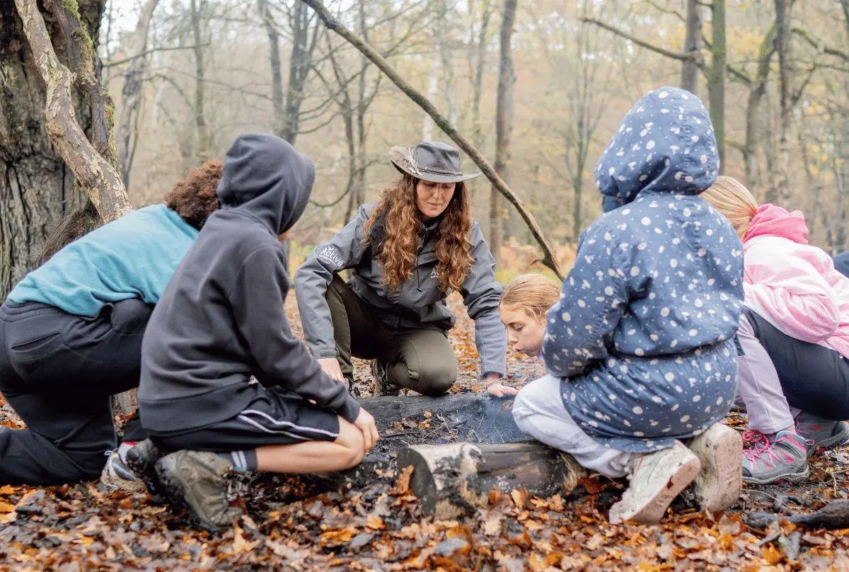 children learning bushcraft skills
