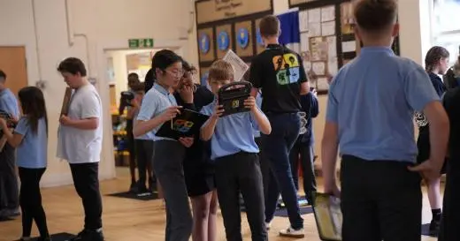 group of children enjoying an augmented reality Roman history game